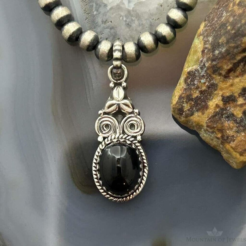 Sterling Silver Southwestern Style Oval Onyx Decorated Charm/Pendant For Women